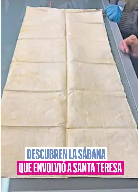 DESCUBREN LA SÁBANA
QUE ENVOLVIÓ A SANTA TERESA