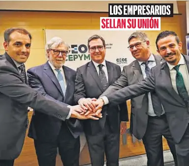 LOS EMPRESARIOS SELLAN SU UNIÓN