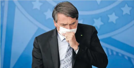 Mu­dan­ça. Bol­so­na­ro usa más­ca­ra em even­to no Pla­nal­to so­bre a aqui­si­ção de va­ci­nas; pre­si­den­te vi­nha dis­pen­san­do o uso do equi­pa­men­to de pro­te­ção