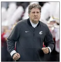 Sources have said that Arkansas Ath­letic Di­rec­tor Hunter Yu­rachek and deputy ath­letic di­rec­tor Jon Fagg have spent the past few days in­ter­view­ing coach­ing can­di­dates across the na­tion, and Wash­ing­ton State Coach Mike Leach (above) may have been on their itin­er­ary.