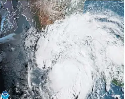 Hur­ricane Erick weakened as it crashed into the coastal moun­tains of south­ern Mex­ico on Thursday.