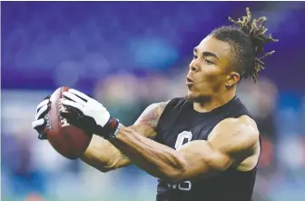 Cana­dian wide re­ceiver Chase Claypool im­pressed pro scouts with his speed, power and ath­leti­cism as he ran drills on Thurs­day at the NFL scout­ing com­bine in In­di­anapo­lis.