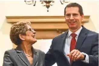 Kath­leen Wynne and her pre­de­cessor Dalton McGuinty in 2013. R apidly rising energy prices hampered the polit­ical for­tunes of both premi­ers.