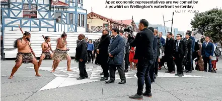 Apec eco­nomic rep­re­sen­ta­tives are wel­comed by a powhiri on Welling­ton’s wa­ter­front yes­ter­day.