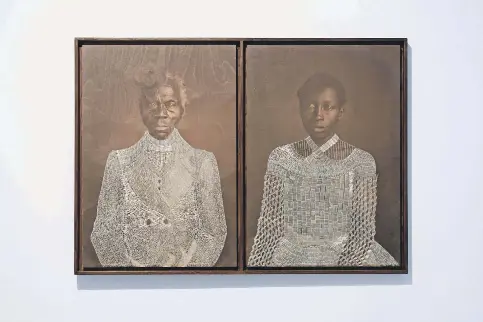 In Sasha Huber’s Tail­or­ing Free­dom, 2021, the artist repro­duced a photo by Louis Agassiz that ori­gin­ally showed Renty, an enslaved per­son, and his daugh­ter, Delia, naked from the waist up as part of his racial inequal­ity argu­ments. Huber used a staple gun to clothe Renty and Delia.