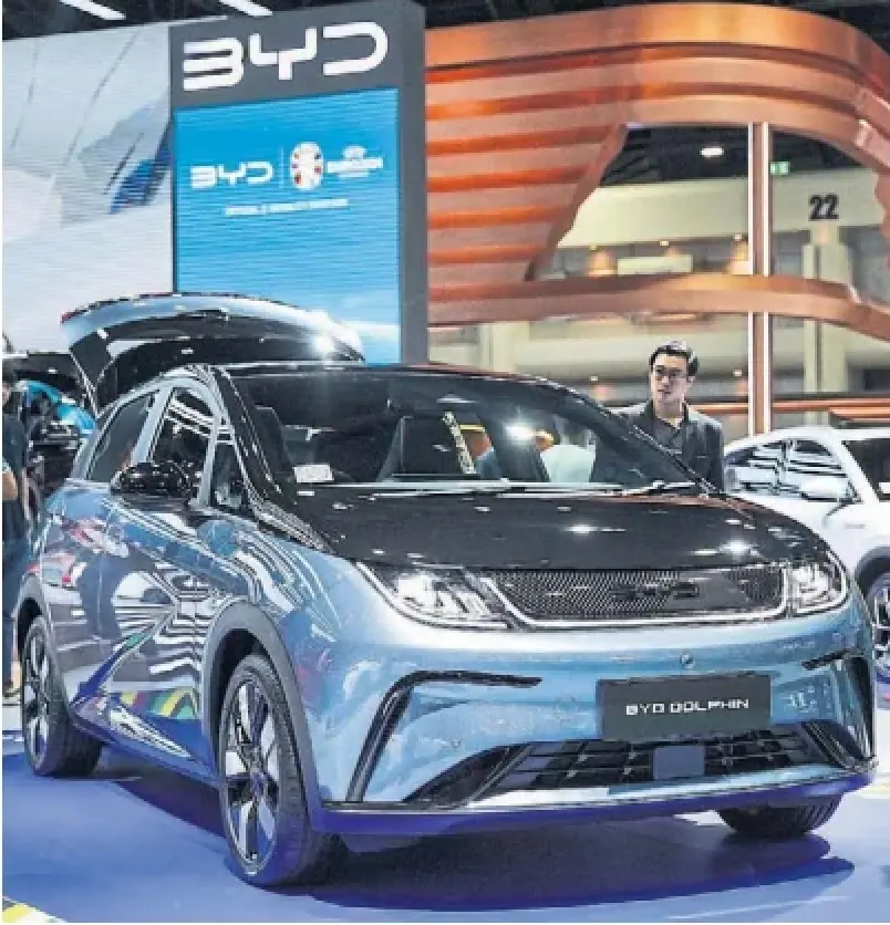 Many Canadians wonder why we should keep a 100 per cent tariff on affordable Chinese EVs, like this BYD Dolphin. A survey found fourinfive Canadians would prefer a lower tariff or no tariff at all, write Joanna Kyriazis and Trevor Melanson.