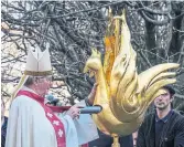 Notre Dame Cathedral gets new golden rooster weathervane