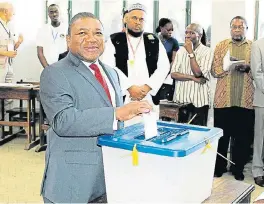 Truth be told: Mozam­bique’s pres­i­dent Filipe Nyusi casts his bal­lot for lo­cal elec­tions at a polling sta­tion in Ma­puto on Wed­nes­day. Mozam­bique holds polls that could re­veal cracks in its peace process af­ter the Fre­limo party was ac­cused of vi­o­lence and in­tim­i­da­tion dur­ing the cam­paign. /