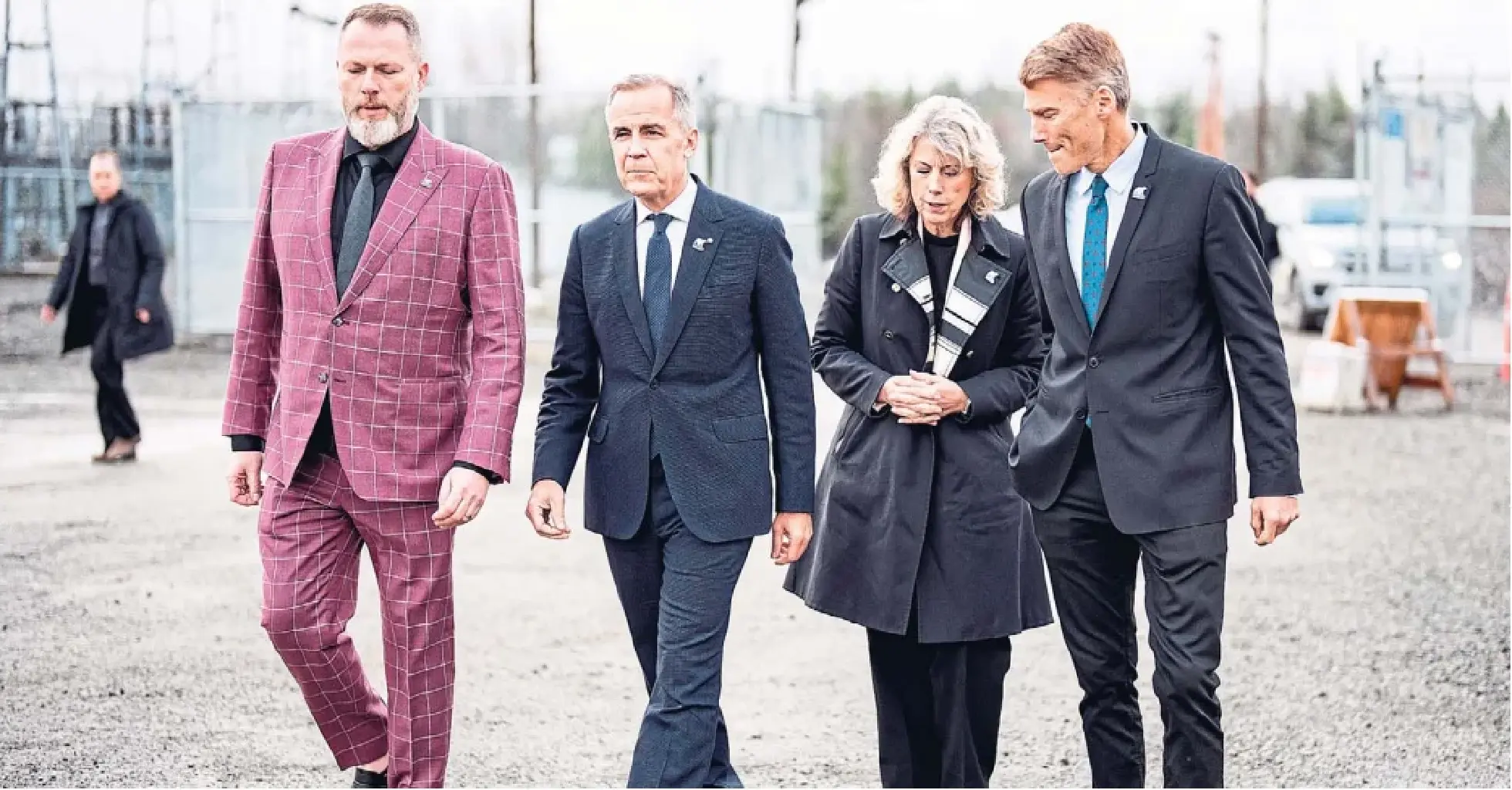 Terrace Mayor Sean Bujtas, left, Prime Minister Mark Carney, Major Projects Office CEO Dawn Farrell and Housing Minister Gregor Robertson in Terrace, B.C.