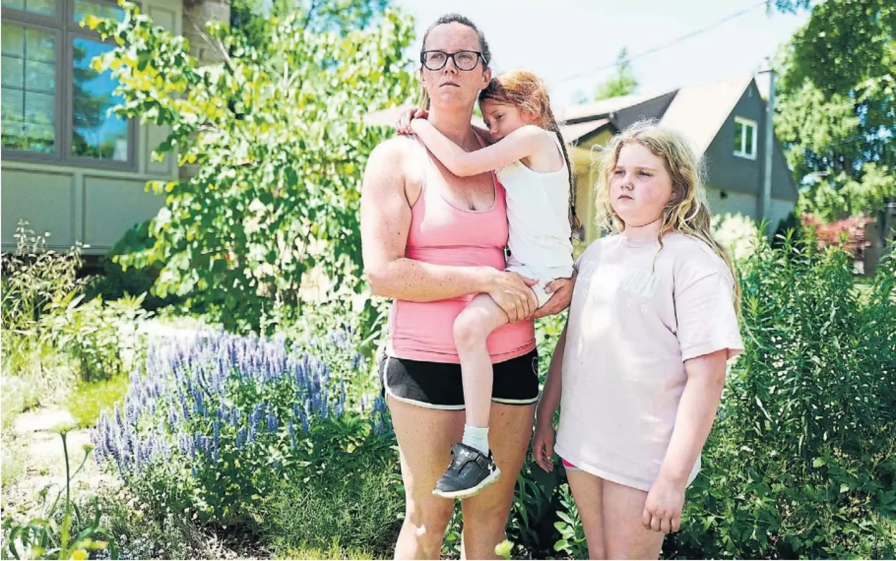 Andrea Frenke pulled her daughters Liridon, 6, and Everest, 9, out of school early Monday because they were feeling ill from the extreme heat.