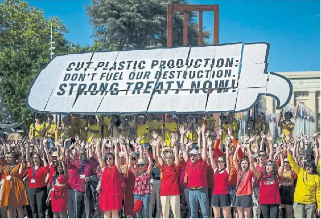 Activists protest outside the United Nations Offices in Geneva on Monday. Between 19 million and 23 million tons of plastic waste leak into aquatic ecosystems annually, which could jump 50 per cent by 2040 without urgent action, according to the UN.