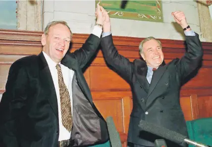 Jean Chré­tien, then Canada’s prime min­is­ter, and Paul Martin, then fed­eral fi­nance min­is­ter, are ap­plauded by the Lib­eral cau­cus in Fe­bru­ary, 1998. Mr. Chré­tien’s gov­ern­ment fa­mously bal­anced the fed­eral bud­get in 1997-98, largely be­cause of spend­ing cuts.