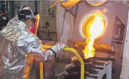 Pure Gold Min­ing’s first gold pour­ing is pic­tured in Red Lake in North­west­ern On­tario in De­cem­ber, 2020. Over the course of the next year, the com­pany is plan­ning to ramp up to full pro­duc­tion with about 350 em­ploy­ees.