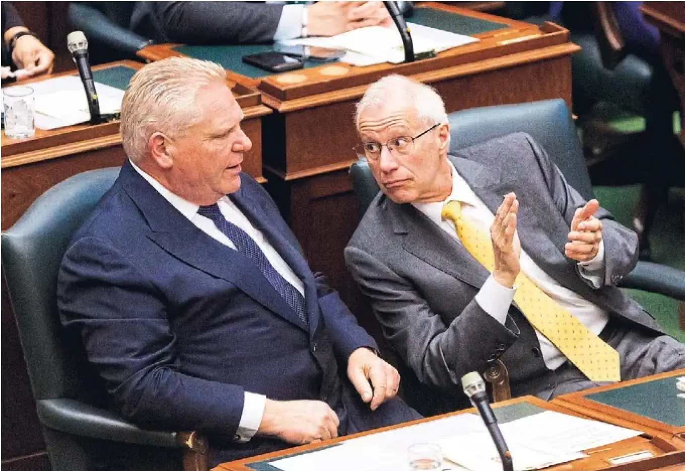 Premier Doug Ford, left, and Economic Development Minister Vic Fedeli are fasttracking development in Ontario with new regulations that allow the province to bypass local and provincial rules for “trusted proponents and projects.”
