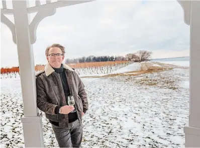 Au­thor, winelover, bon vi­vant Jens Hansen in the vine­yards at Konzel­mann Es­tate in Ni­a­gara-On­The-Lake.