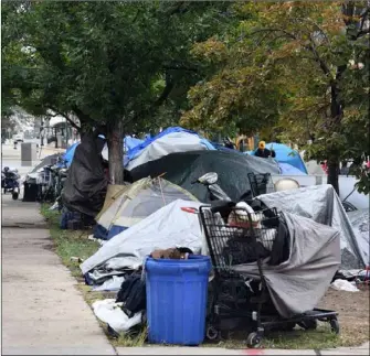 Many home­less camp along Wel­ton and the ad­ja­cent streets in down­town.
