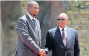 MANDLA Man­dela and then pres­i­dent Ja­cob Zuma in 2013.