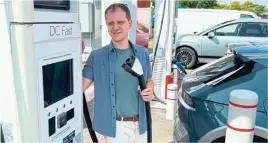 Of the three char­gers at two loc­a­tions I tried to pho­to­graph Alex Rodi­onov and his EV with, one DC char­ger was being used, and the dual higher­speed char­gers at Petro­Canada were both not work­ing (note the black screen), writes Michael Betten­court.