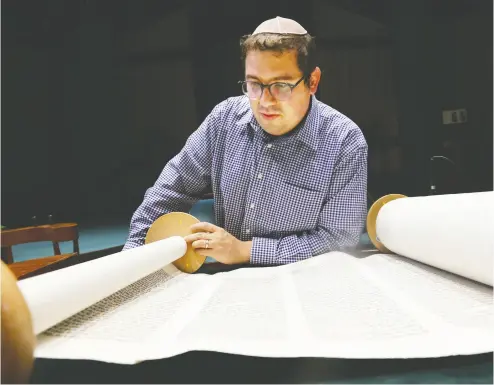 Rabbi Ey­tan Ken­ter of Ot­tawa led a con­tin­gent of 30 con­gre­gants to Arusha, Tan­za­nia, to de­liver a To­rah scroll to a
small Jewish tem­ple there. The hand­writ­ten parch­ment scroll is the holi­est doc­u­ment in Ju­daism.