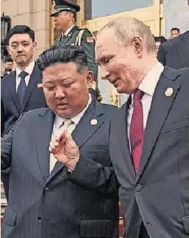 Below: Vladi­mir Putin with Kim Jong Un after a 2025 meet­ing in Beijing in which the Rus­sian leader thanked Kim for send­ing North Korean troops to fight along­side Rus­sian forces against Ukraine