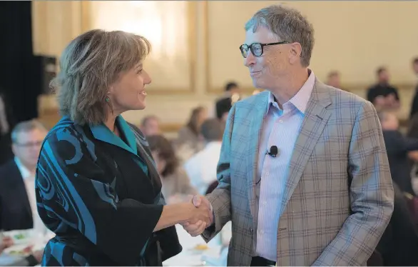 Mi­crosoft co-founder Bill Gates greets Pre­mier Christy Clark in 2016. Tech giants like Mi­crosoft have a strong pres­ence in Van­cou­ver.